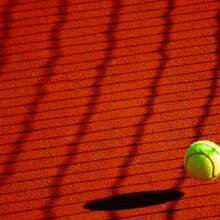 Tennis ball on court