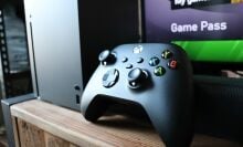 Xbox Series X controller next to console