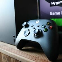 Xbox Series X controller next to console
