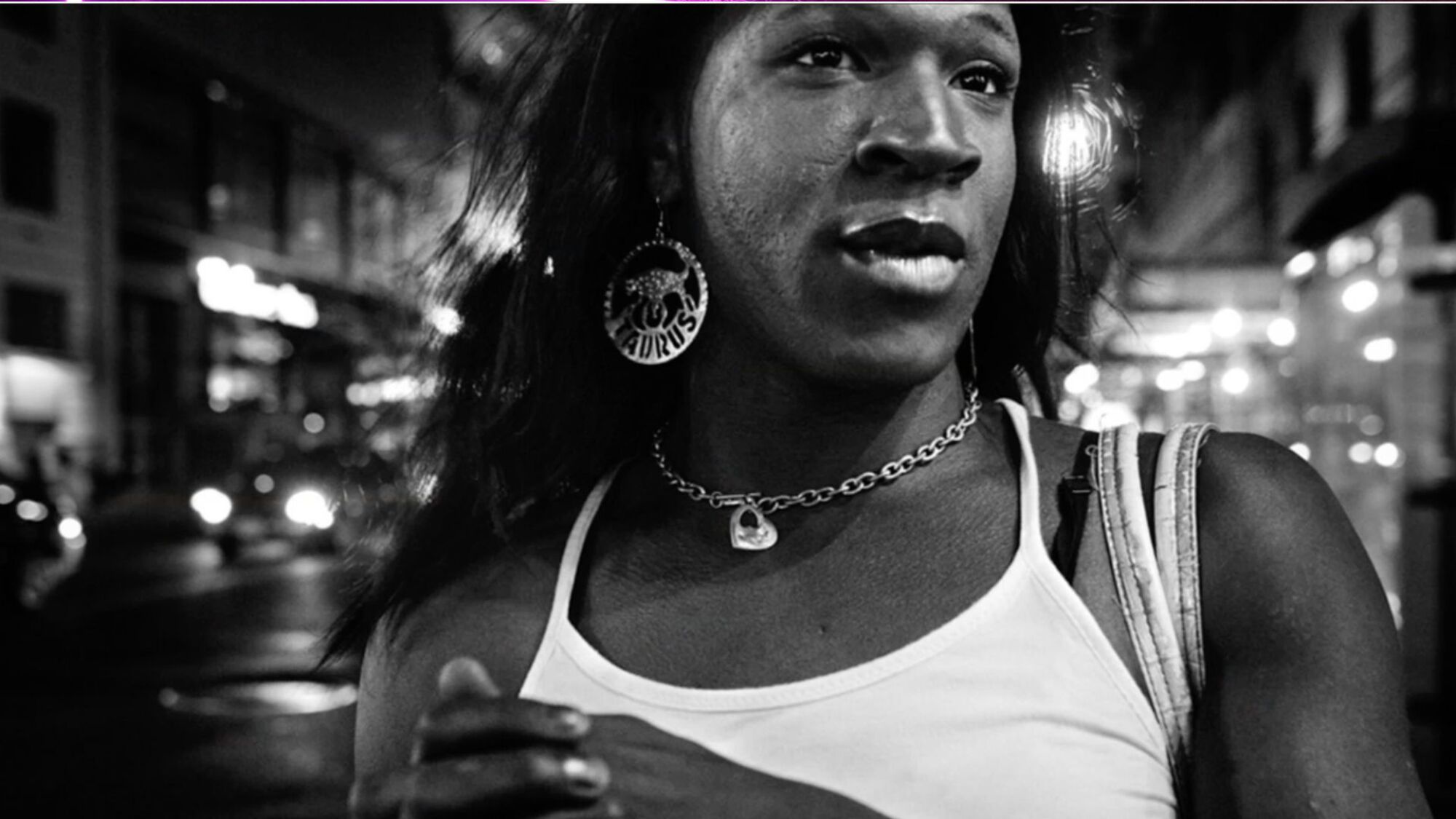 A Black woman on the streets of Manhattan on "The Stroll."