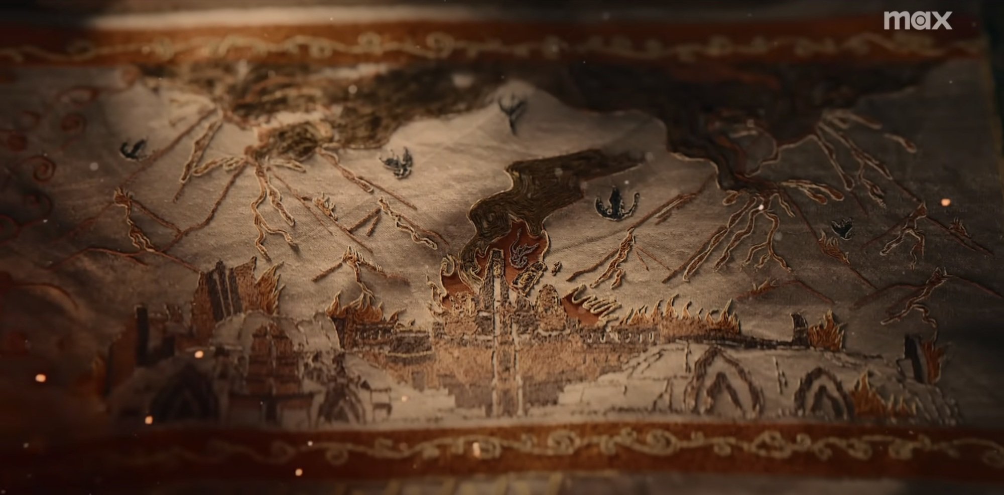 A tapestry of Old Valyria on fire with dragons falling from the sky.