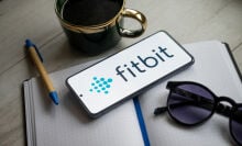 Fitbit logo on phone screen