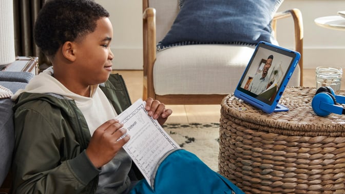 kid watching a video on a tablet