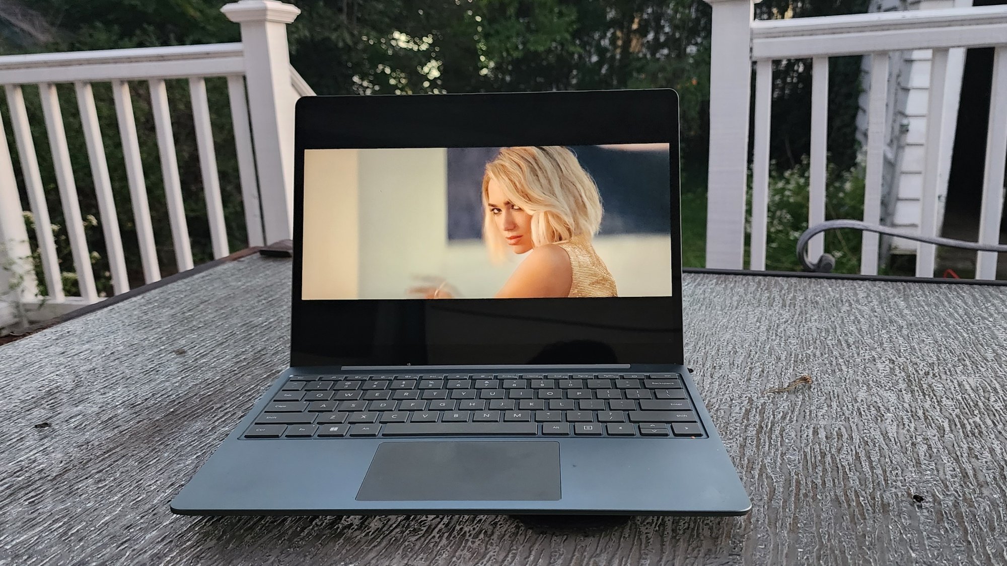 Microsoft Surface Laptop Go 3 with Dua Lipa on the screen