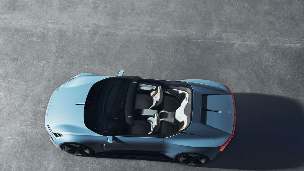 Looking from above down to an opened baby blue convertible.