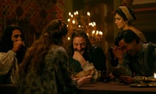 In "The Decameron" a group of nobles giggle at a dinner table.