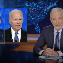 Jon Stewart on "The Daily Show" beside an image of Trump and Biden.