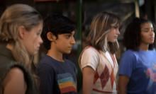 Four tweens stand in a line in the Apple TV+ show "Me."