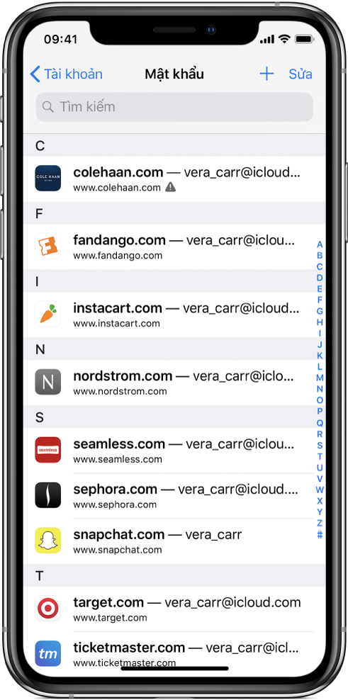 Một màn hình mật khẩu hiển thị theo thứ tự chữ cái danh sách trang web và tên tài khoản của các trang web đó. Trang web đầu tiên được liệt kê có cảnh báo mật khẩu được sử dụng lại bên cạnh URL của trang web đó.