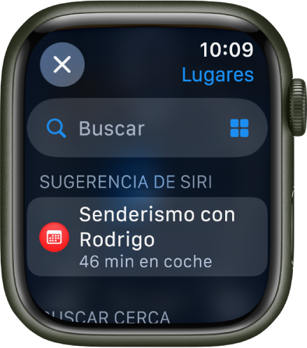 La pantalla Buscar de la app Mapas, con el campo Buscar cerca de la parte superior. Debajo aparece una sugerencia de Siri. En la parte inferior se muestra el encabezamiento “Buscar cerca”.