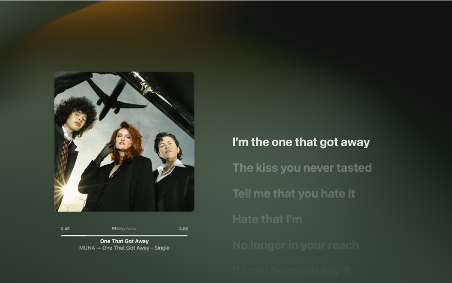 The Full Screen Player with a song playing and lyrics on the right, which appear on-screen in time with the music.