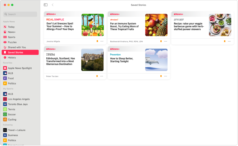 The Apple News window showing Saved Stories selected in the sidebar and four saved stories arranged in a grid on the right.