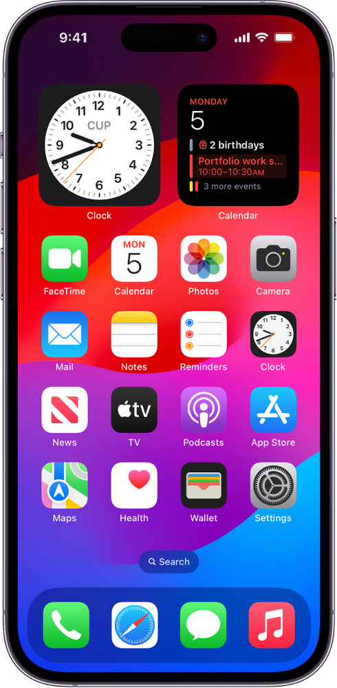 The iPhone Home Screen with Dark Mode on.