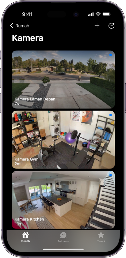 Skrin Kamera, menunjukkan imej daripada tiga kamera keselamatan—laman depan, gim rumah dan dapur. Di bawah nama setiap kamera ialah masa yang telah berlalu sejak imej dikemas kini. Contohnya, kamera laman depan menunjukkan imej yang dikemas kini 7 saat yang lalu.