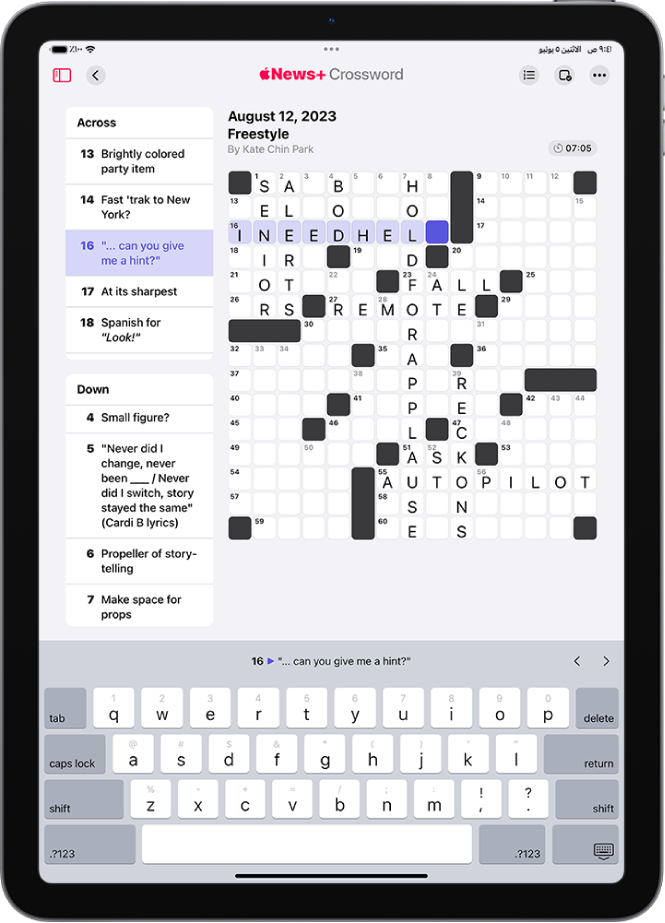 لغز كلمات متقاطعة مملوء جزئيًا، مع وجود أدلة على جانب واحد ولوحة مفاتيح مفتوحة في الأسفل.
