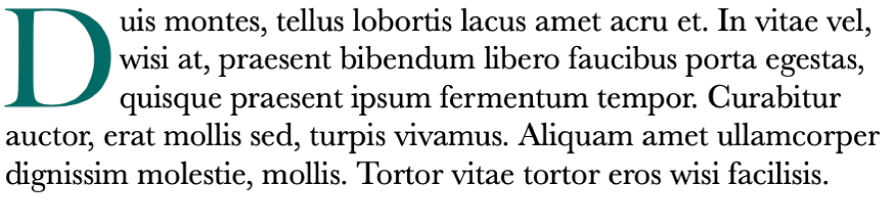 Et eksempel på en uncial, der udgør bogstavet D først i et afsnit og er udformet som et stort grønt bogstav.