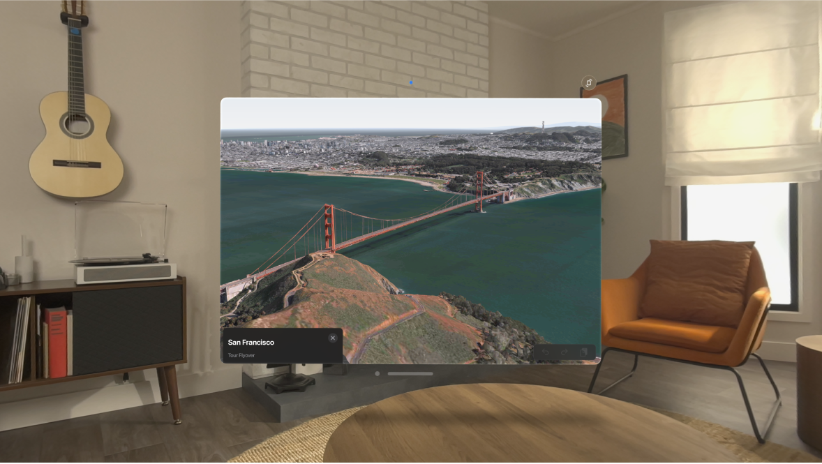 L’app Plans sur l’Apple Vision Pro qui affiche le survol de San Francisco.
