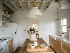 The new kitchen in the farmhouse that Leanne renovated with her brother Steve Ford, Leanne decided to leave the ceiling beams uncoverd to keep the farmhouse design as seen on Restored by the Fords   Kitchen after 1