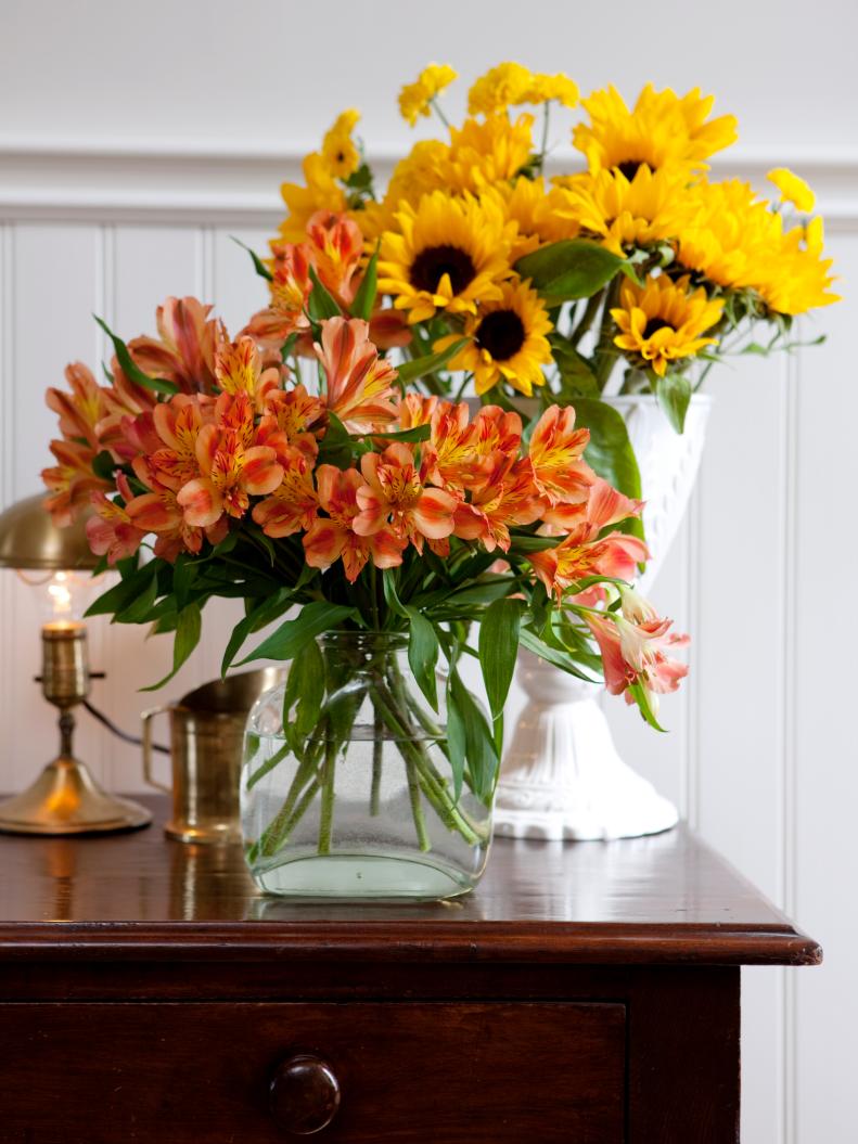 Vases With Yellow Sunflowers and Orange Alstroemeria