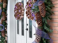 Pinecone garland around home's door