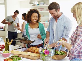 Group Of Friends Having Dinner Party At Home