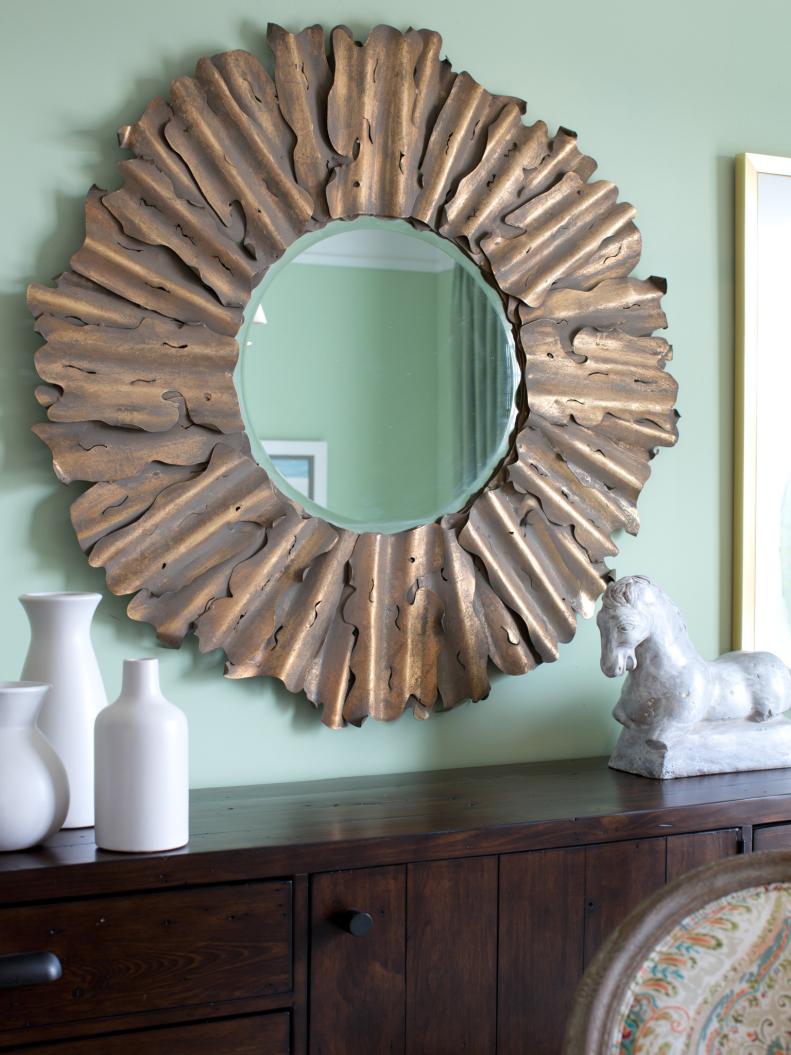 Oversized Metallic Mirror in Dining Room 