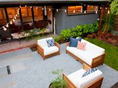 Modern Seattle Courtyard with Stone Pavers, Lighting and Seating