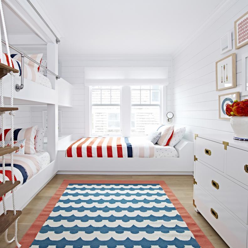 White Coastal Kids Bedroom With Red, White and Blue Accessories