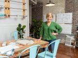 Erin Napier (R) works with designers Amanda Connolly (L) and Blake Erskin (C) on the design options for the Luker House in Laurel, Mississippi. (portrait)