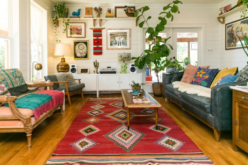 Farmhouse Living Room With Southwestern Art And Midcentury Modern Seat