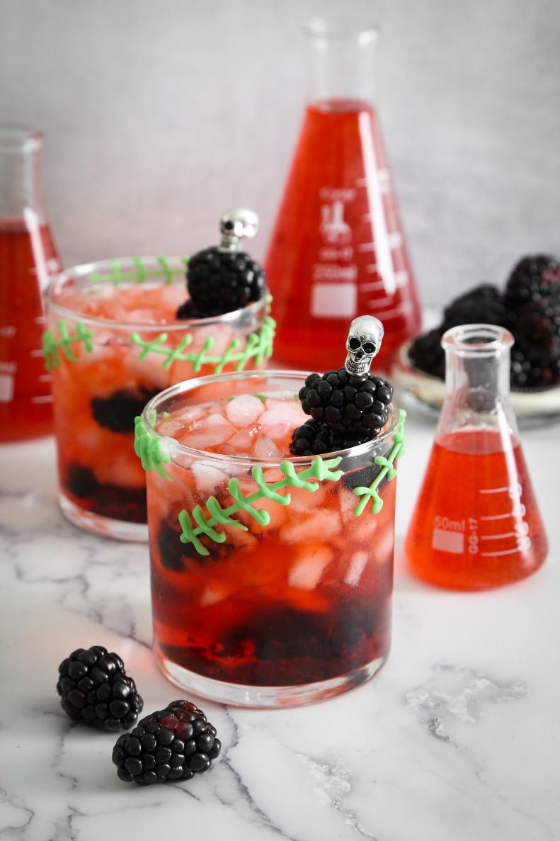 Alter the classic bourbon smash with muddled fresh blackberries to create a different kind of cocktail creature.  For special effect, pipe monster stitches onto each glass using melted candy. 