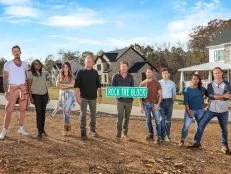 As seen on HGTV’s Rock the Block season 2, the cast and host Ty Pennington poses with the houses in the background.