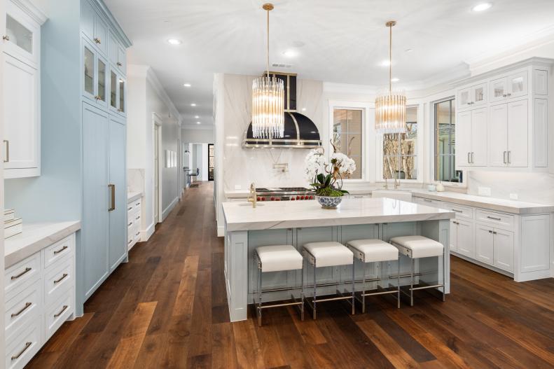 White Chef Kitchen With Blue Refrigerator