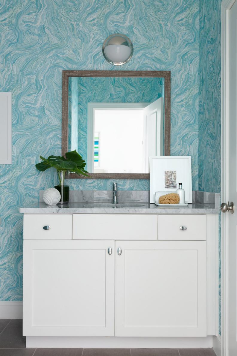 Coastal Bathroom With Decorative Blue Wallpaper Inspired by Italian Summer