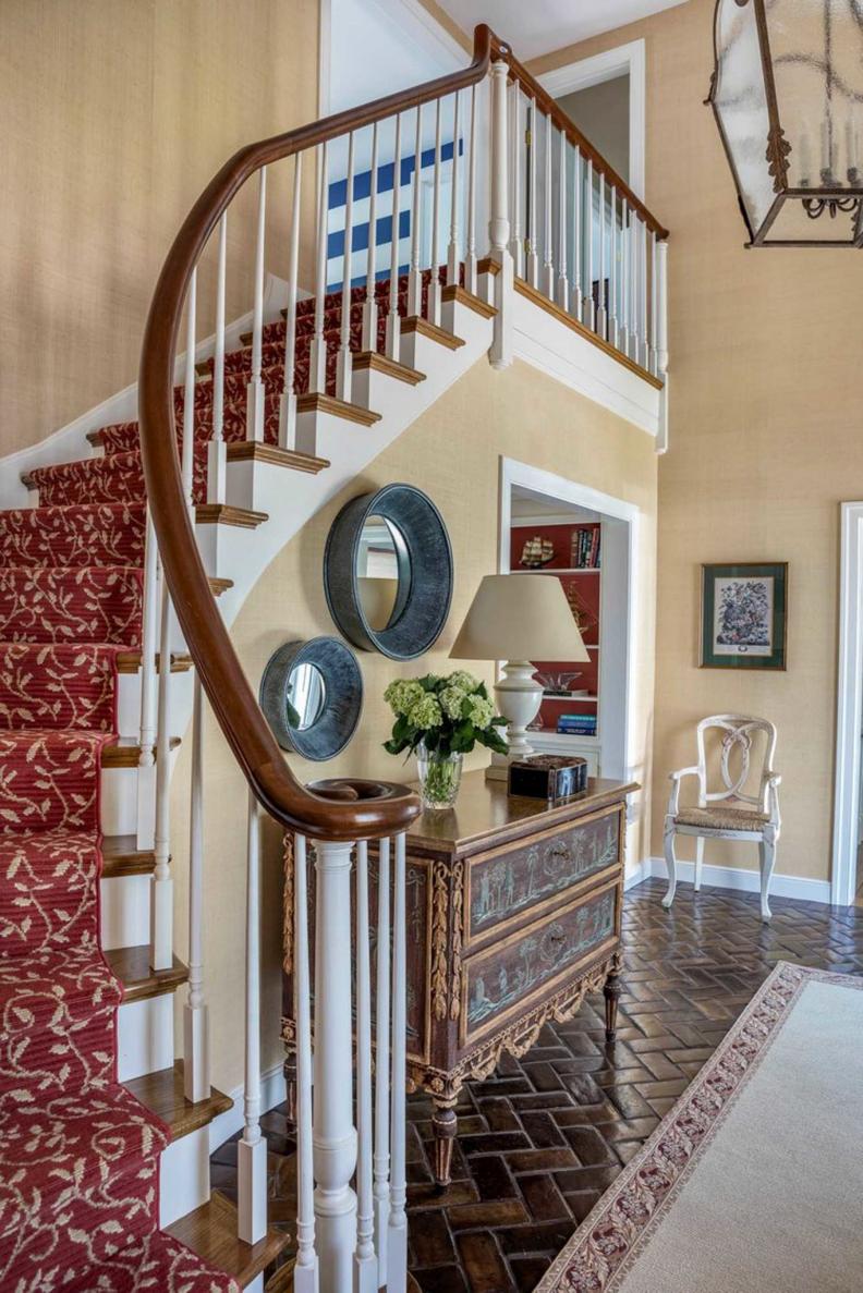 Foyer With Red Stair Runner