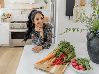 Veronica Valencia shows off a smile in the kitchen pre-reveal