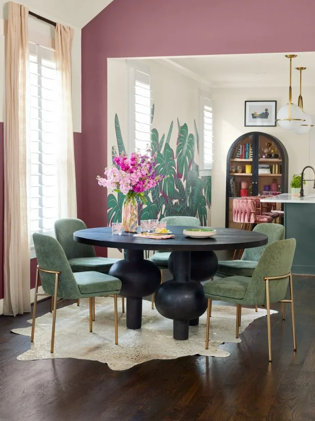 This boho dining room from HGTV Magazine features mauve walls and a leafy hand-painted mural.