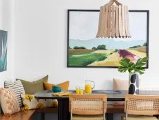 White Breakfast Nook With Statement Art