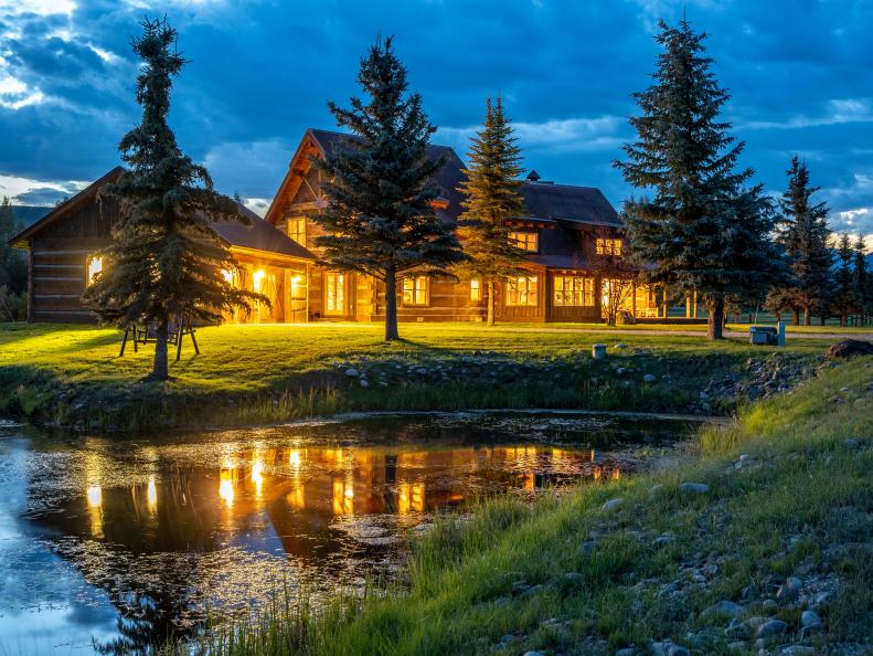 Cabin and Pond at Night