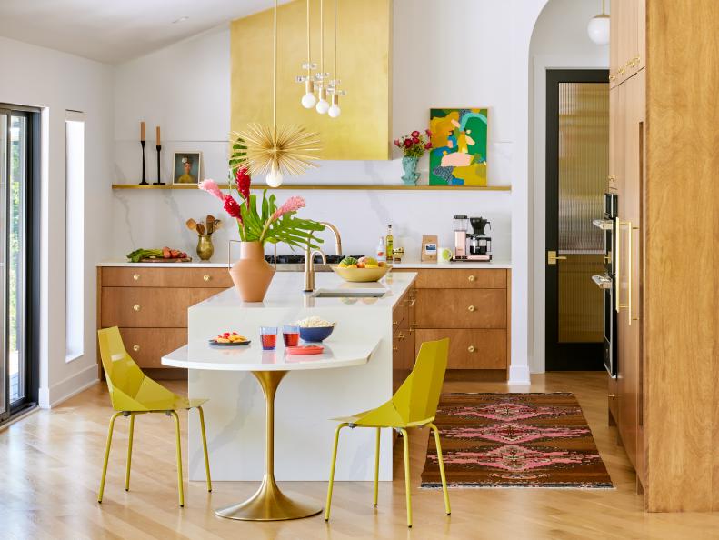 White Midcentury Kitchen With Teak Wood and a Gold Range Hood