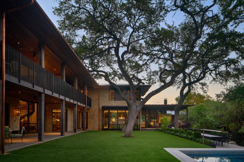 Large Tree in Manicured Backyard With Pool