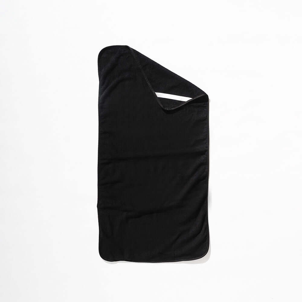 A black fabric HigherDOSE PEMF Mat Cover