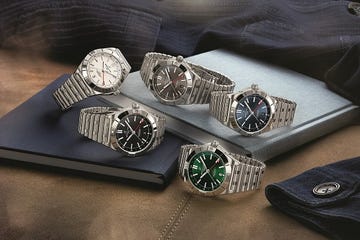 breitling chronomat automatic gmt 40 from left to right white, black, anthracite, blue, green dialcmyk