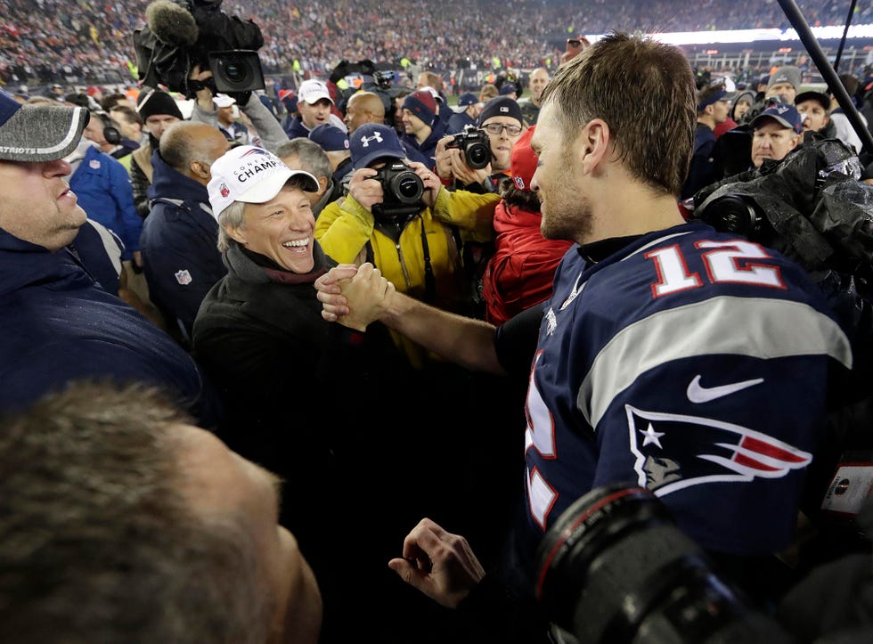 txgdgb jon bon jovi congratulates with new england patriots tom brady on the field after the game against the pittsburgh steelers in the afc championship game at gillette stadium in foxborough, massachusetts on january 22, 2017 the patriots defeated the steelers 36 17 and advance to play the nfc champion atlanta falcons in super bowl li in houston texas photo by john angelillo upi