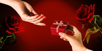 a person holding a gift box