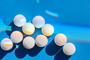 pills on blue background