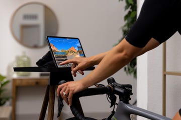 a person on a bicycle using a laptop for fulgaz