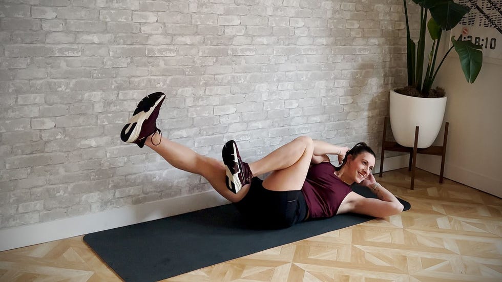 aerobic workout, amber rees practices bicycle exercise