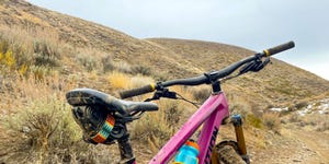 a bicycle parked on a hill