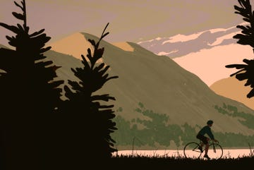 a person riding a bicycle on a mountain